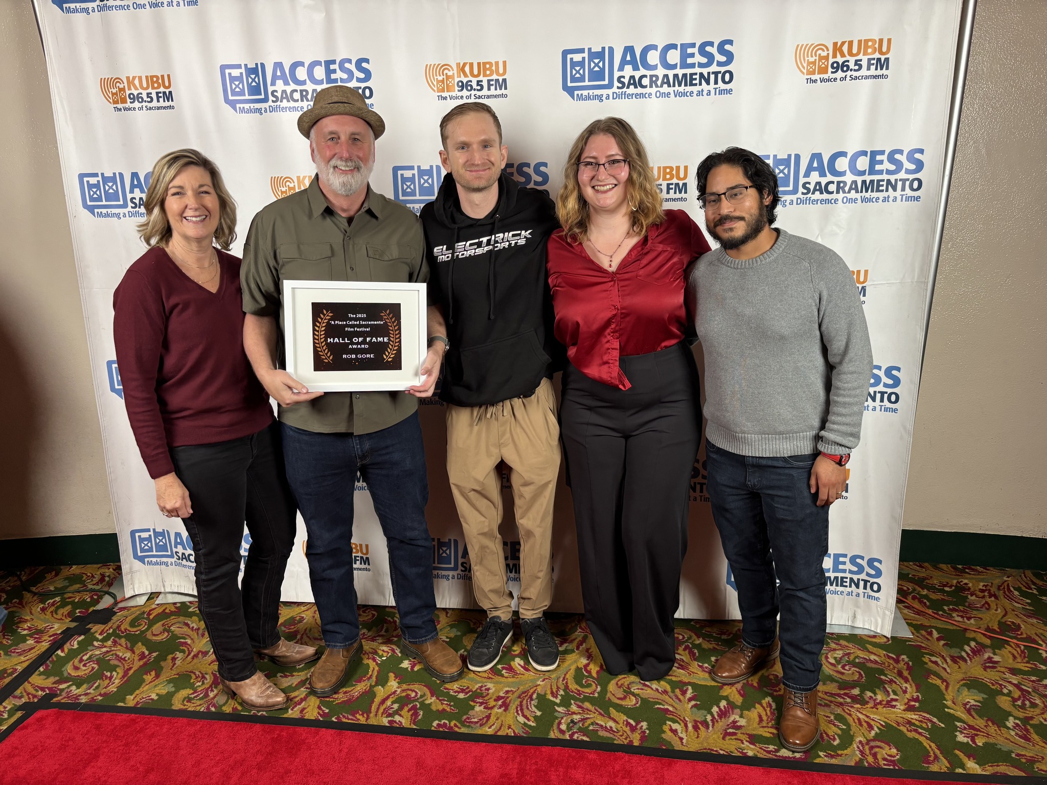 Rob Gore and team celebrating the Hall of Fame accomplishment.